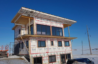 House in the Îles de la Madeleine -- floor joists, walls and roof trusses