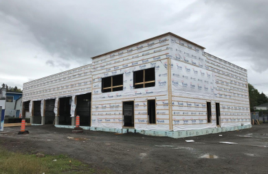 Fire station in Mont-Joli -- floor joists, walls and roof trusses