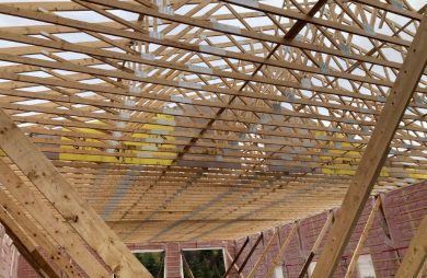 Garage at Lac au Saumon -- manufacture of roof trusses.